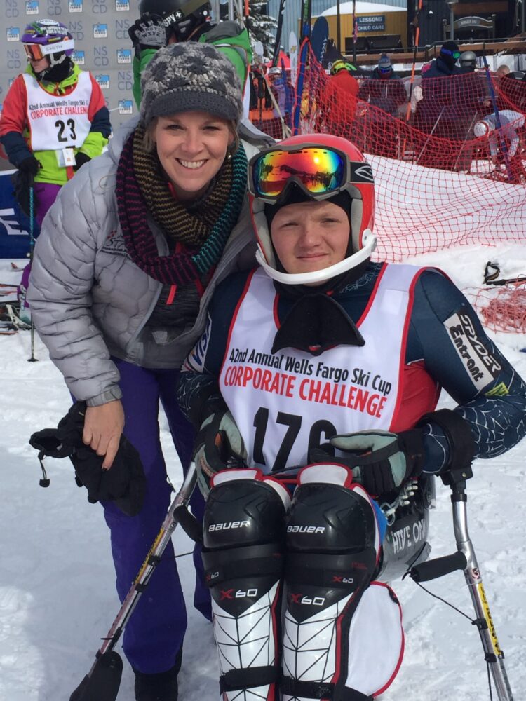 Julie Taulman and her son, Kyle, who dressed in ski gear, pose for a photo