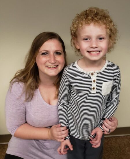 Stephanie Bowers poses with her son