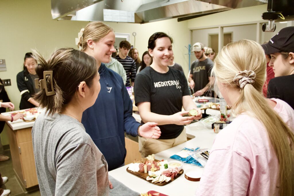 Nutrition Science senior Sarah Kossler leads a class on food photography.