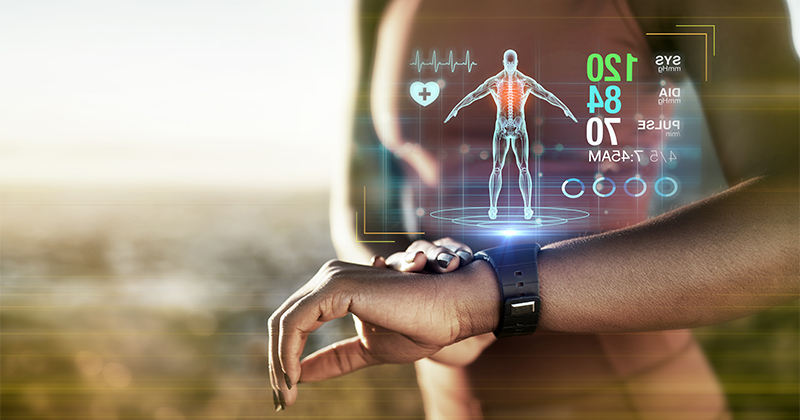 Adobe Stock image of a digital stats screen coming out of a smart watch.