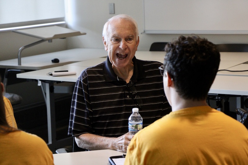 A man participates in vocal exercises in a recent SPEAK OUT! session.