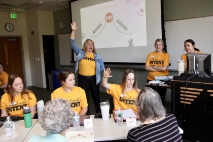 Lydia Kruse and her graduate students lead a SPEAK OUT! session.