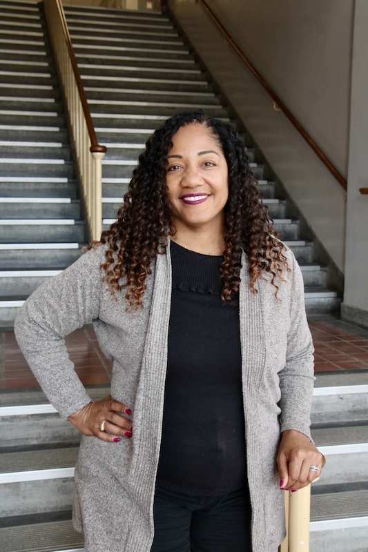 Kayce Solari Williams poses for a picture in Matthews Hall.