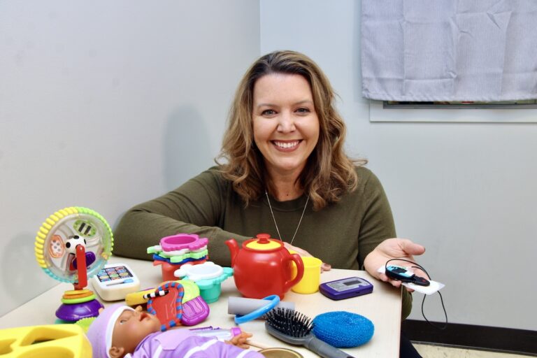 Bridgette Kelleher displays some of the items in her PANDABox project.