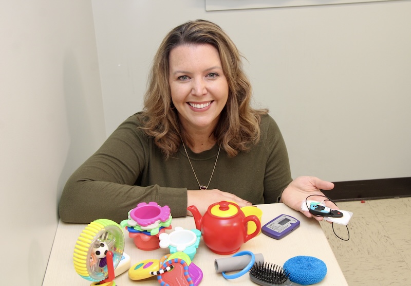 Bridgette Kelleher displays some of the contents of a PANDABox.