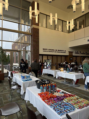 The Marriott Hall atrium is filled with tables for a wellness fair. 