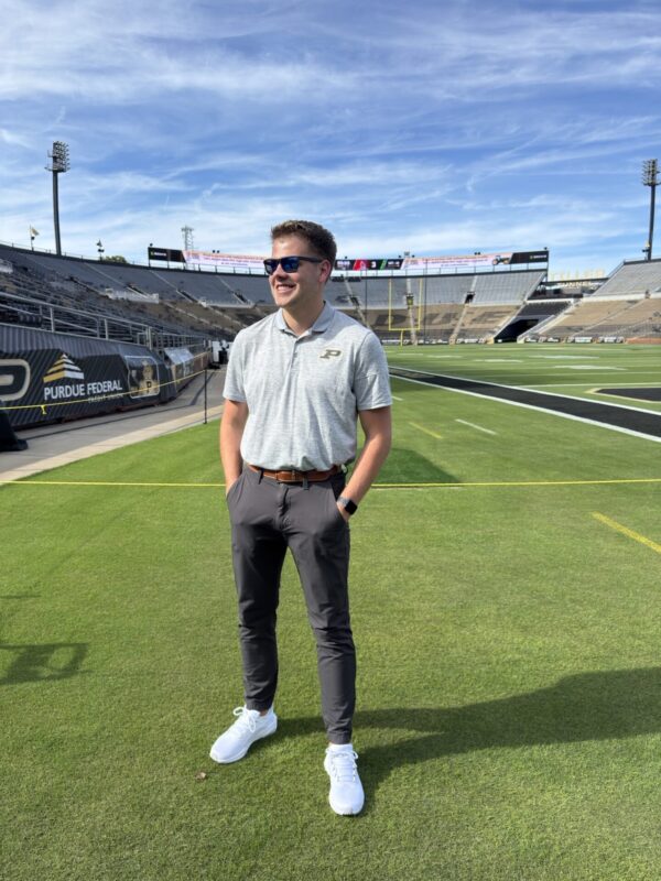 Garrett Pave stands on the Ross-Ade Stadium field for a picture.