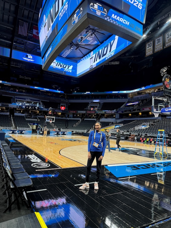 Lucca Agate stands on the Gainbridge Fieldhouse floor before a Big 10 basketball tournament game.