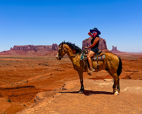 Alyssa Cutter rides on a horse in the Grand Canyon.