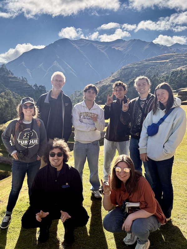 Jonathon Day and students pose for a picture in the Peruvian mountains.