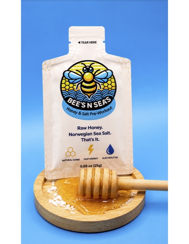 An image of a packet of BEE'S N SEA'S resting in honey.