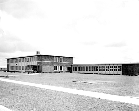 A black-and-white image of a school building.
