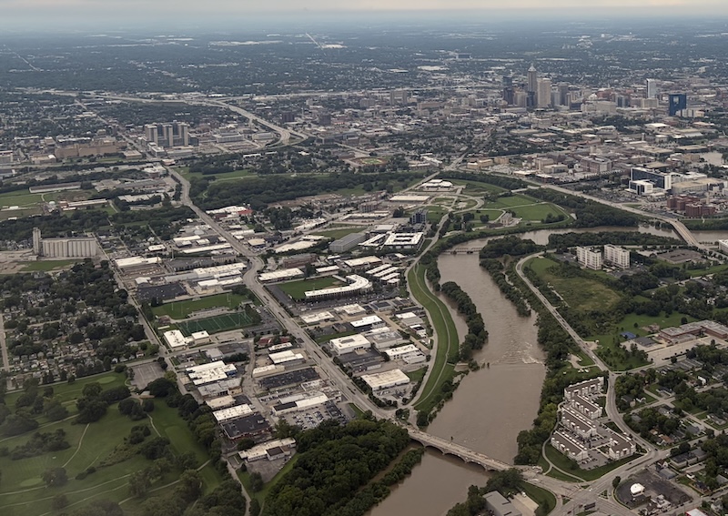 An aerial image of the White River in Indianapolis shows extensive flooding