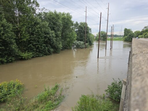 Southport Road in Indianapolis is affected by flood waters from the White River.