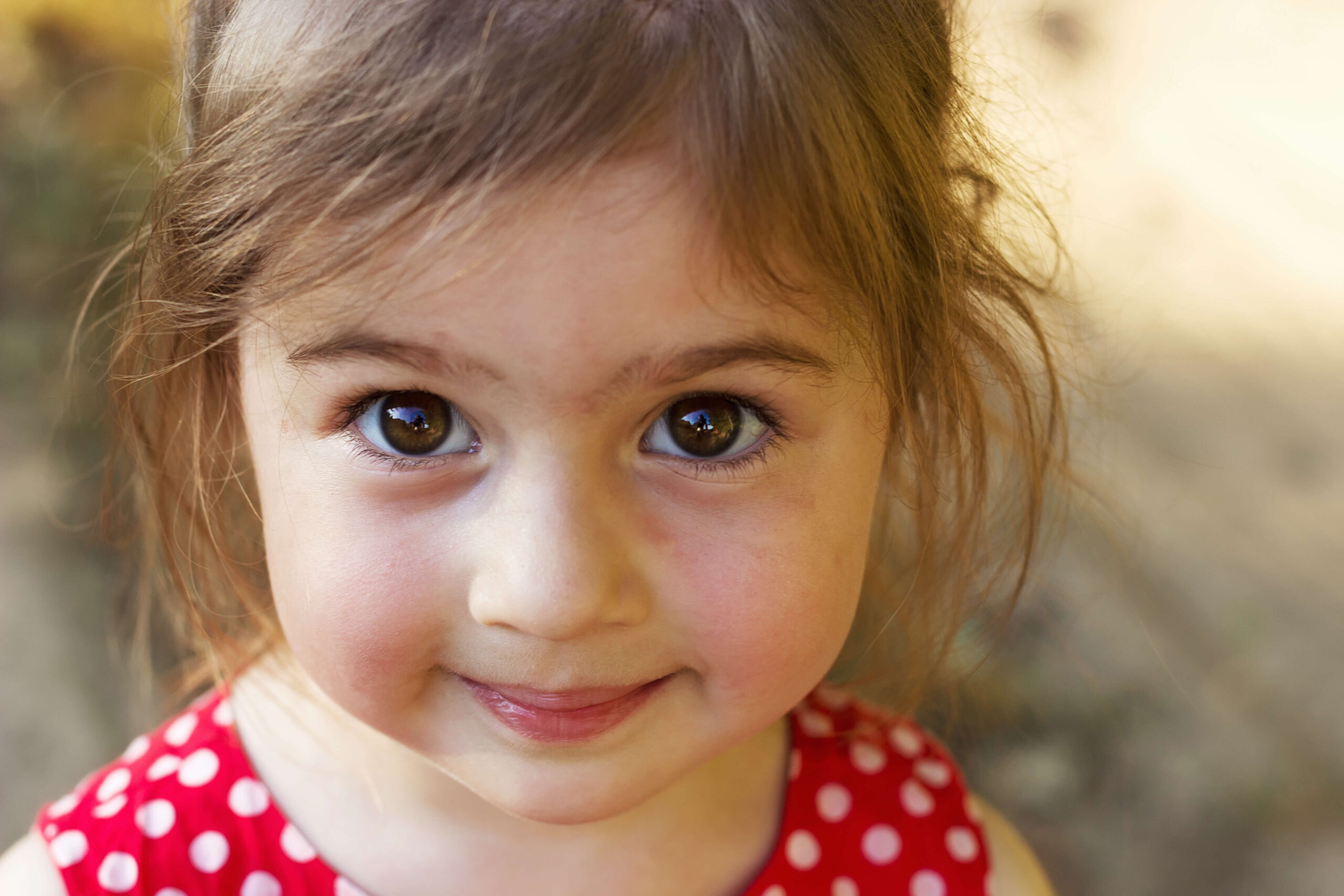 close up image of a toddler girl face