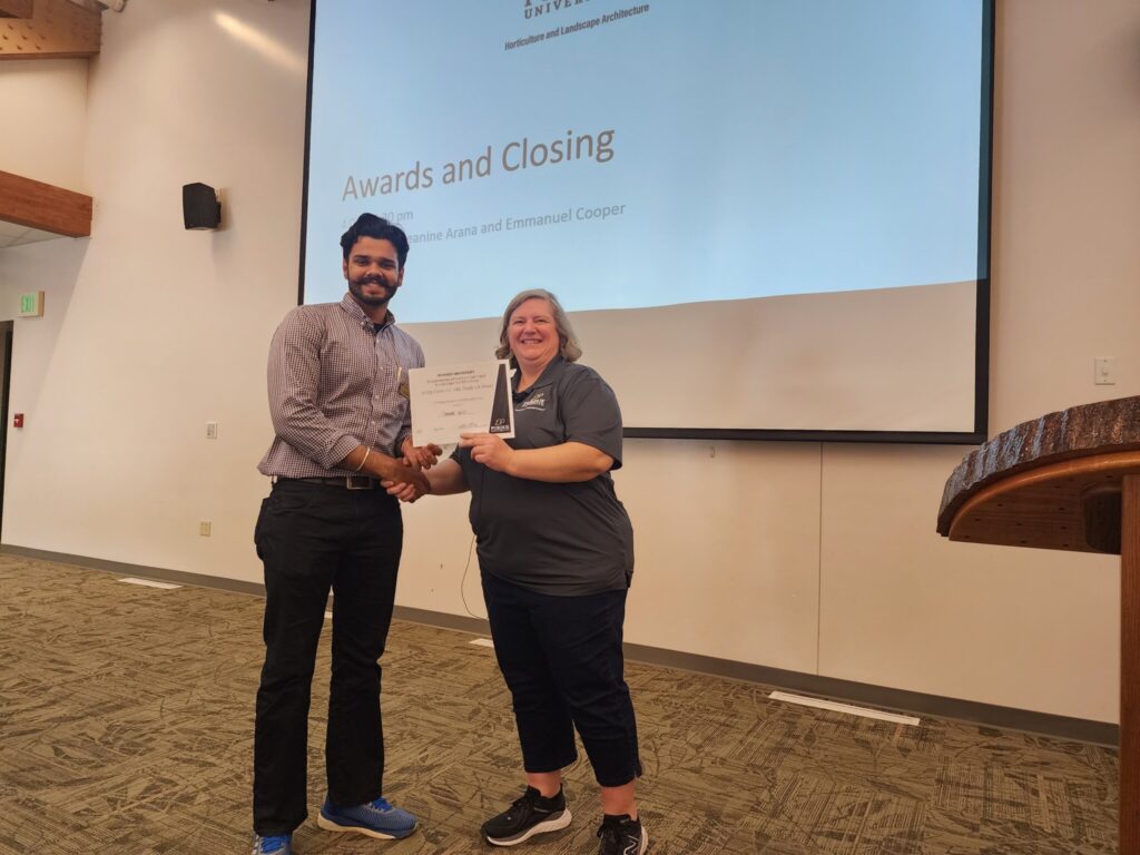 Tanvir Dutt receives 2nd Place Masters Oral Presentation Travel Grant Award from Linda Prokopy.