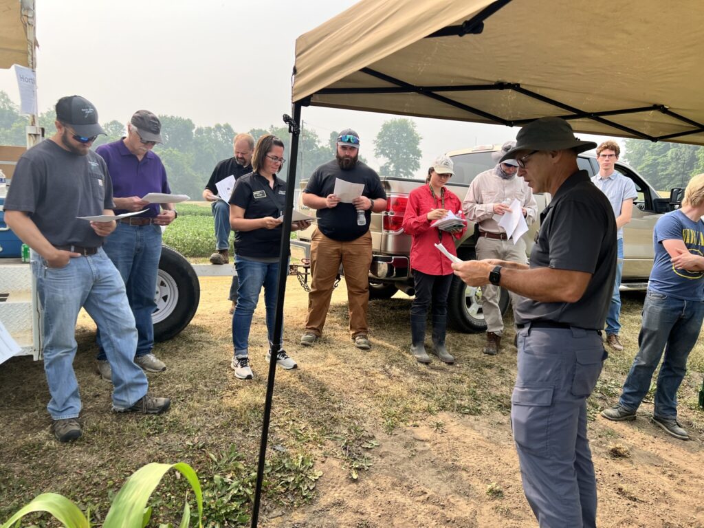 Petrus Langenhoven talking to attendees at the Purdue Southwest Ag Center.