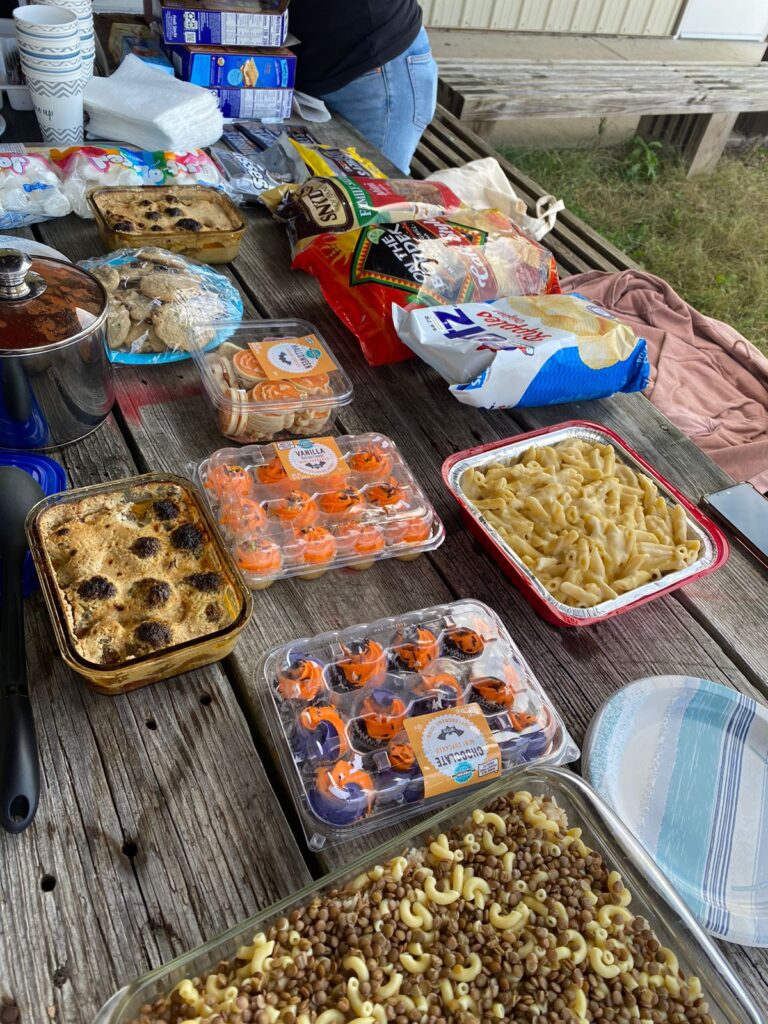 Table spread of food for the potluck.
