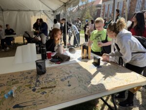 A family at the PASLA table