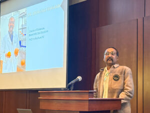 Dr. Srinivas Makam speaking.