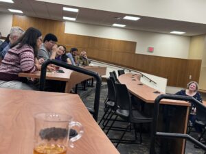 Audience giving remarks about Dr. Linda Prokopy's leadership.