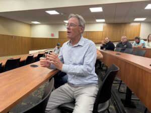 Audience giving remarks about Dr. Linda Prokopy's leadership.