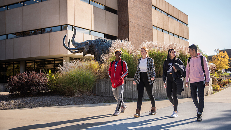 Purdue Fort Wayne students walking around campus.