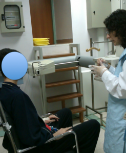Dr. Malandraki performs a swallow x-ray study on a Greek patient.