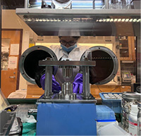 Photo of Palwinder Kaur from the 2021 cohort is seen here making battery cells