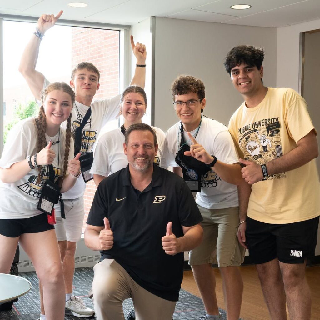 Senior Vice Provost for Purdue University in Indianapolis posing in front of students