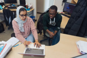 Student and teacher working together