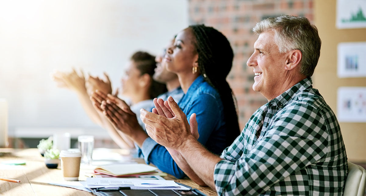 Cropped shot of a group of businesspeople clapping hands