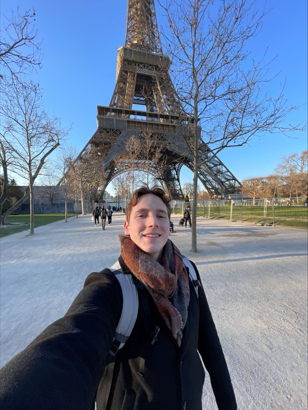 Selfie of John Clark with Eiffel Tower in the background