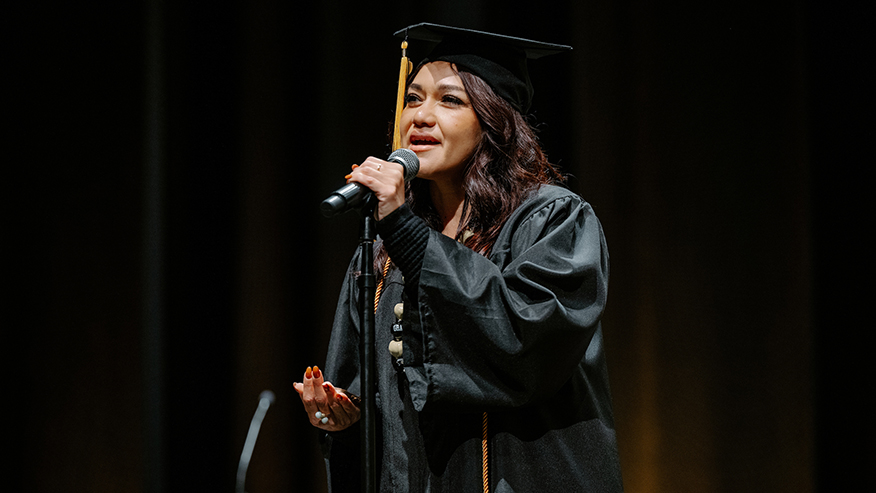 Ickebor Lorena Martinez of Miami sings the national anthem during Purdue Global’s commencement.