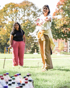 Students play a ring toss game