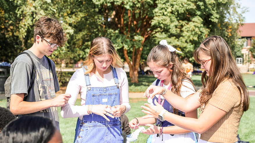 Students making a craft