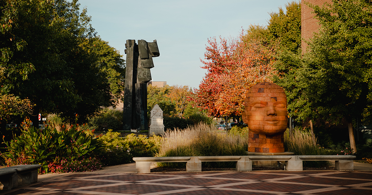 A fall view of a Brickhead sculpture near Purdue University’s Pao Hall of Visual and Performing Arts.