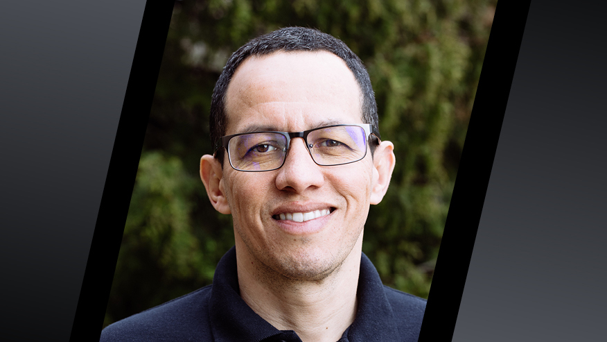 Smiling man in glasses