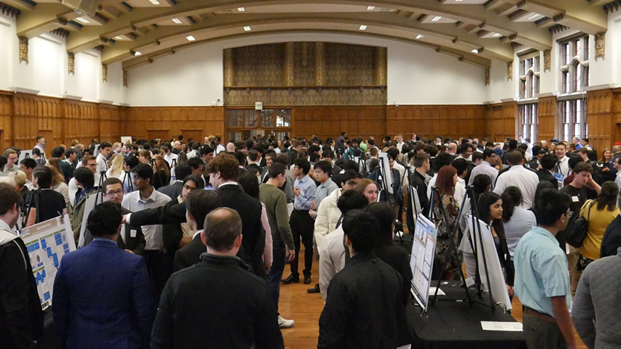 Full room of people mingling