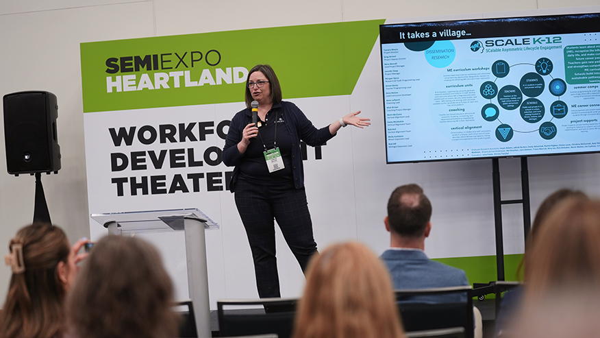 Woman presenting at conference