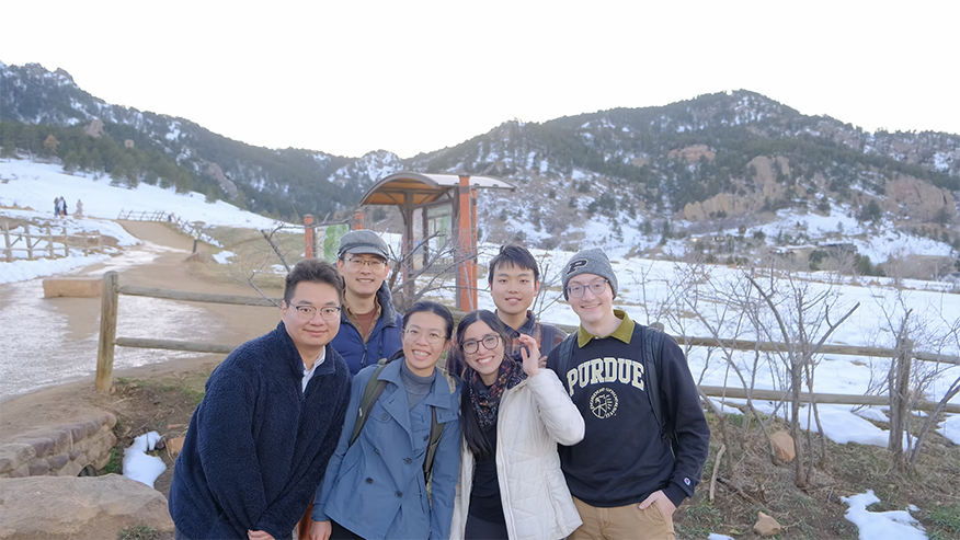 Students with snowy hills in background