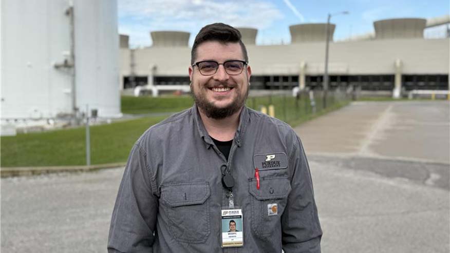 Man standing in front of facility