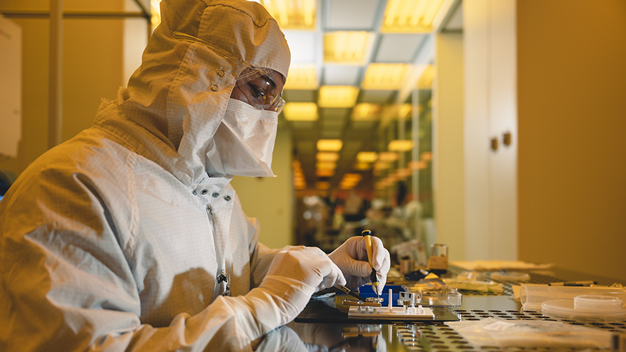 Researcher in cleanroom of Birck Nanotechnology Center.