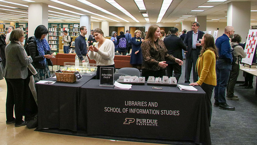 Groups chatting at event