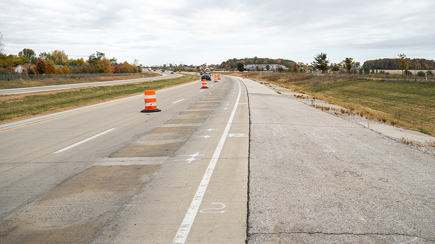 Rectangular pads embedded in a coned-off lane of a highway