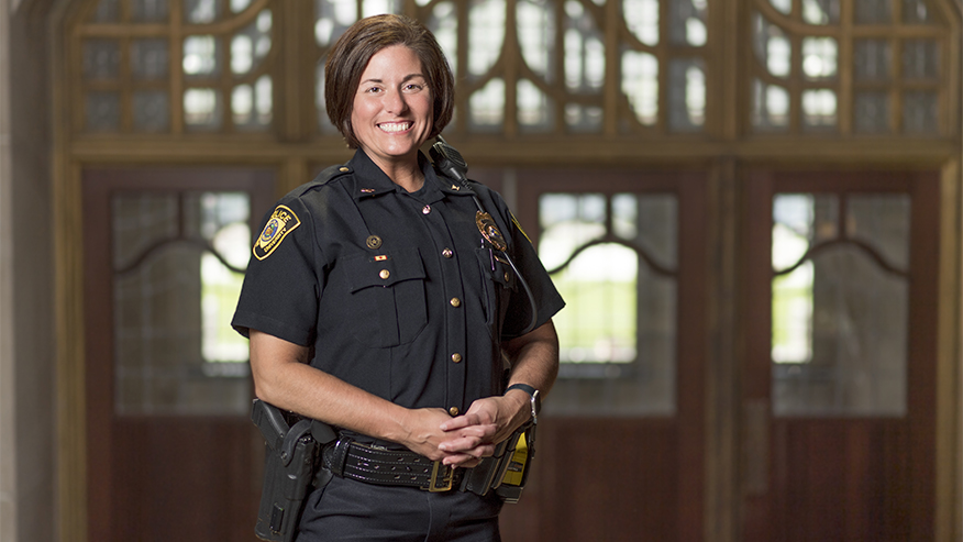 A woman in a police uniform.