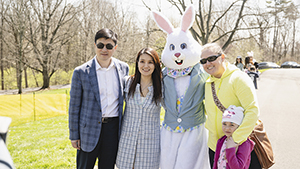 Mung Chiang, Kei Hui pose with the Easter bunny and a family