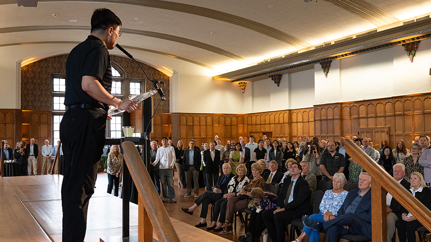President Mung Chiang addresses a large group of attendees.