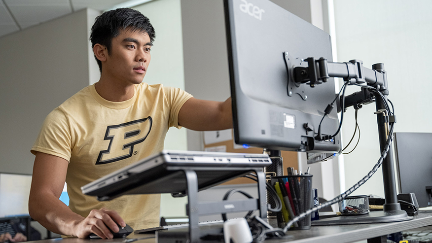A student at a workstation.