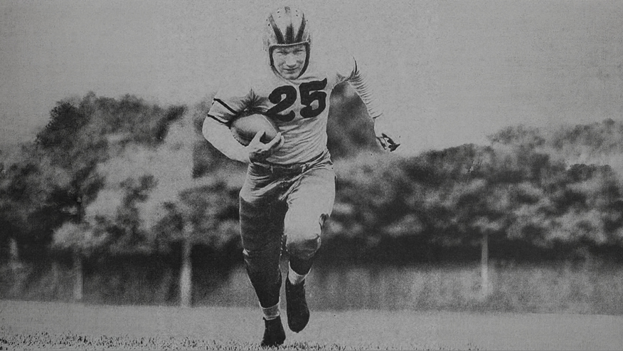 Black and white photo of Purdue football player 